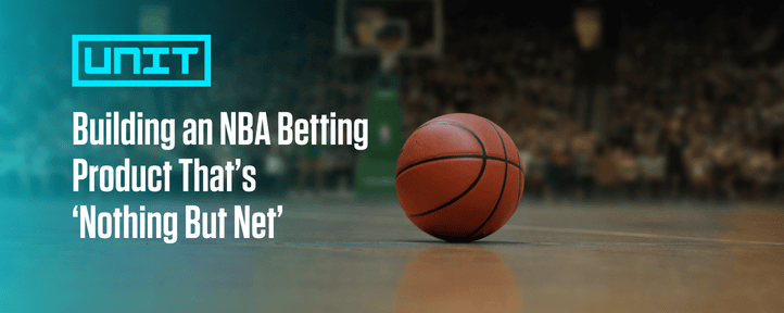 Basketball resting on a hardwood court with blurred arena background and The Unit logo, used as the blog cover image for the article ‘Building an NBA Betting Product That’s Nothing But Net.’